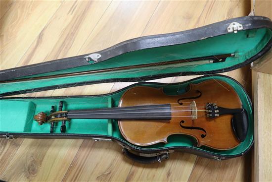 A cased two-piece back violin